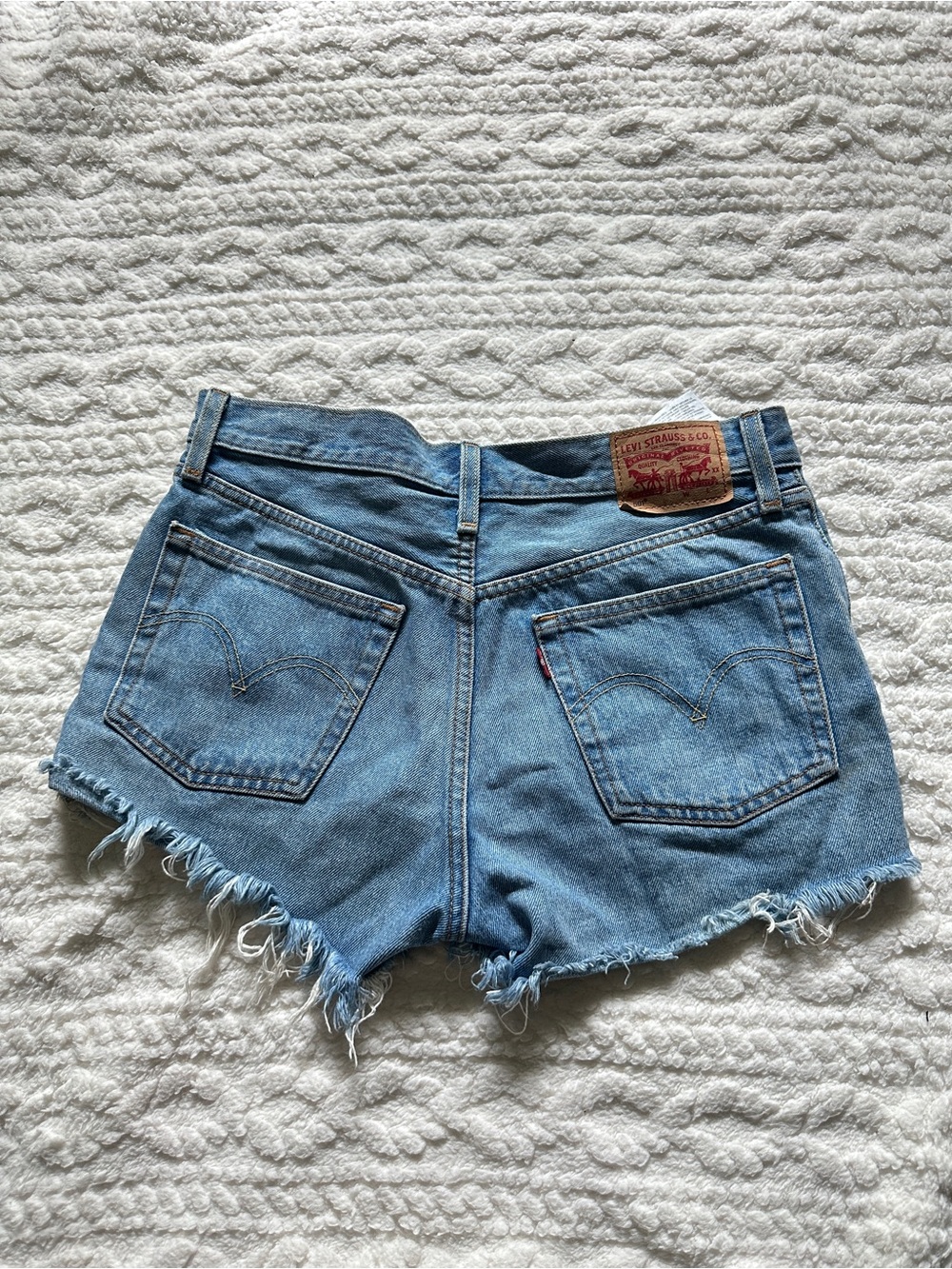 Levi's Medium Blue Frayed Denim Cutoff Shorts